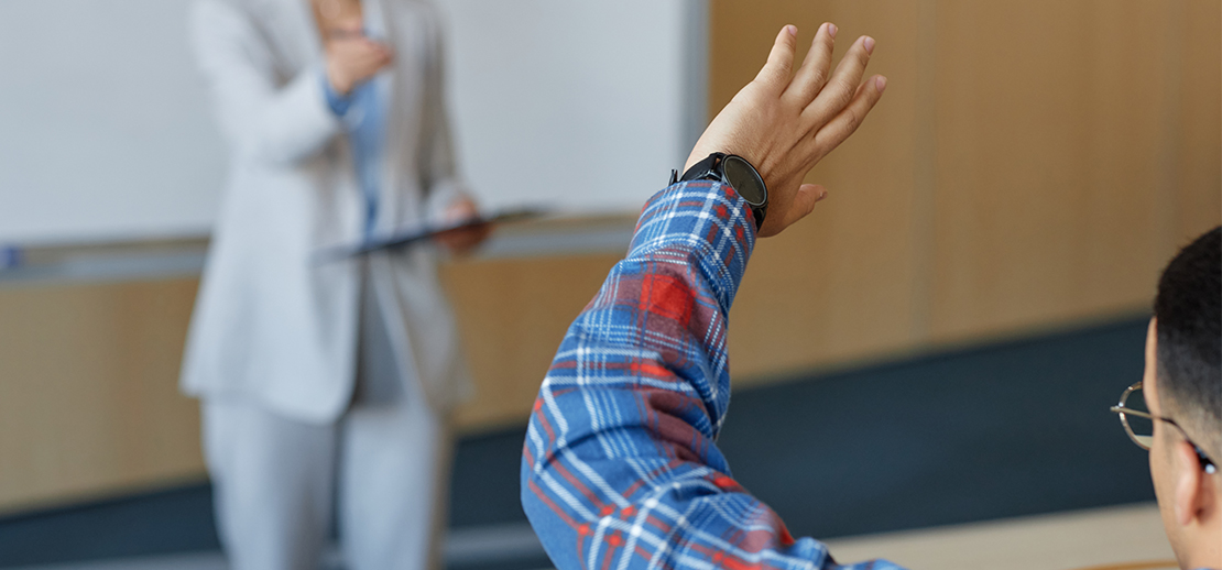 male student raising hand during one of lu caps flourish workshops for enrichment